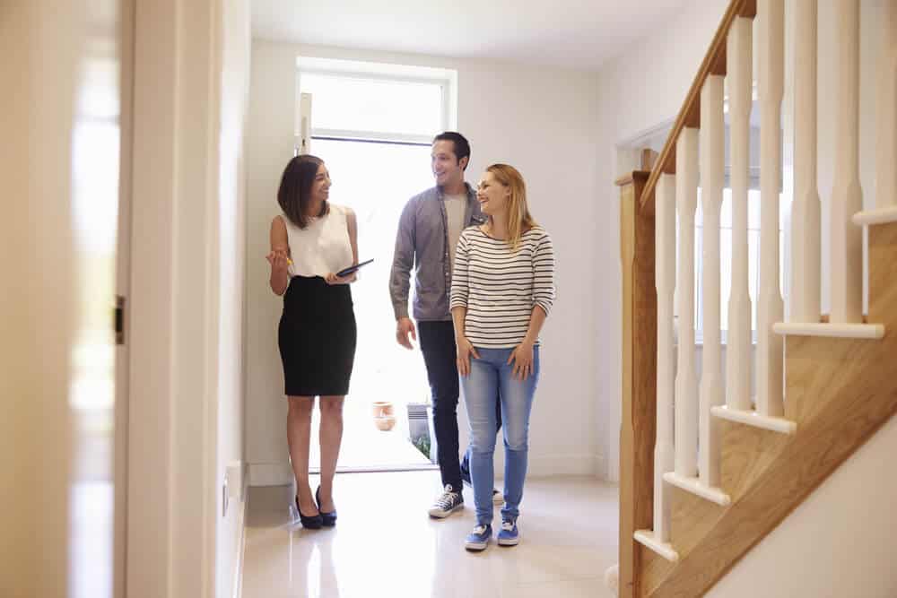 A Couple Viewing A Potential Home For Them - Receiving a Conveyancing Service In Bracknell